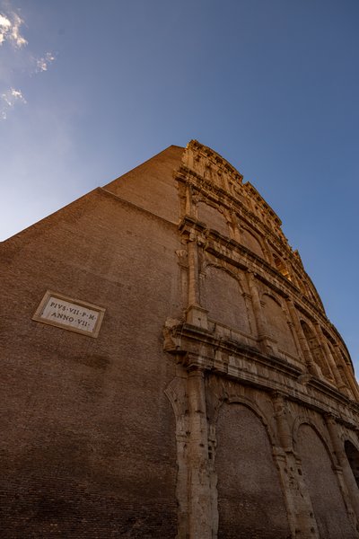 Colosseum facade and Pius VII plaque