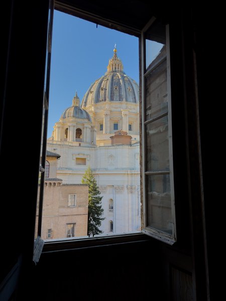 St. Peter's dome framed by shutters