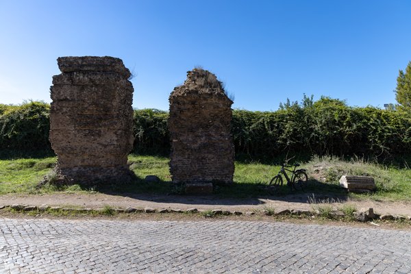 Bicycle by ancient ruins, Appian Way