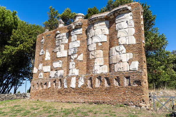 Sculpted reliefs in a brick tomb, Via Appia